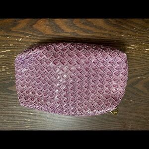 Estee Luader purple makeup bag